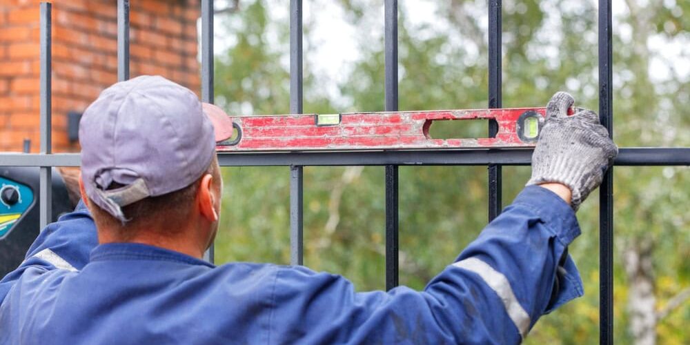 builder fixing fence